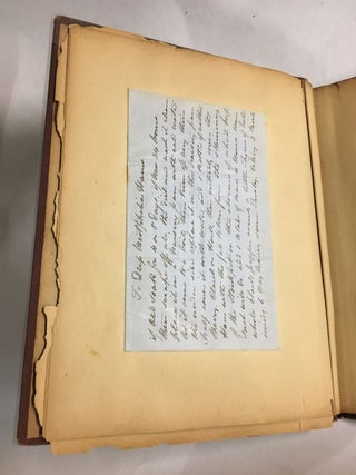 Scrapbook containing individual recipes in French and English.