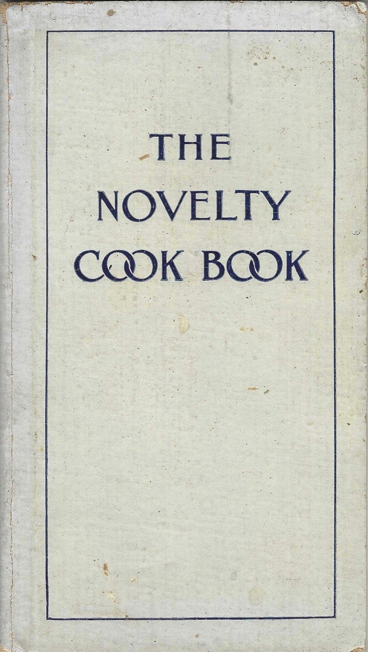Item #8101 The Novelty Cook Book: Over 150 original recipes thoroughly tested with practical talks on how to secure economy, efficiency and success with the kitchen range. Written by a celebrated cooking expert exclusively for Abram Cox Stove Company. Trade catalogue / cookbook – stoves, Abram Cox Stove Co, Philadelphia.